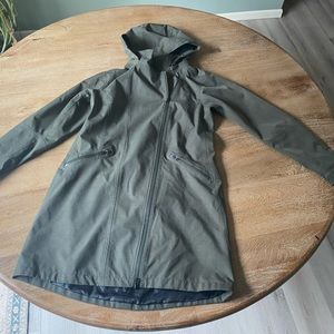 Athleta Asymmetrical zip rain jacket with removable hood.